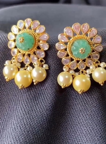 Green earrings with cream pearl