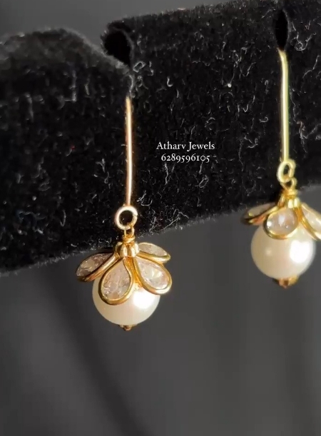 White pearl earrings