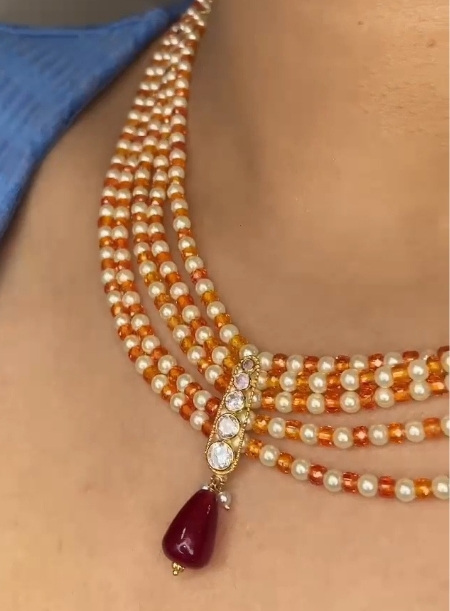Orange and white beads necklace