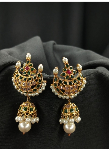 Green earring with white pearl