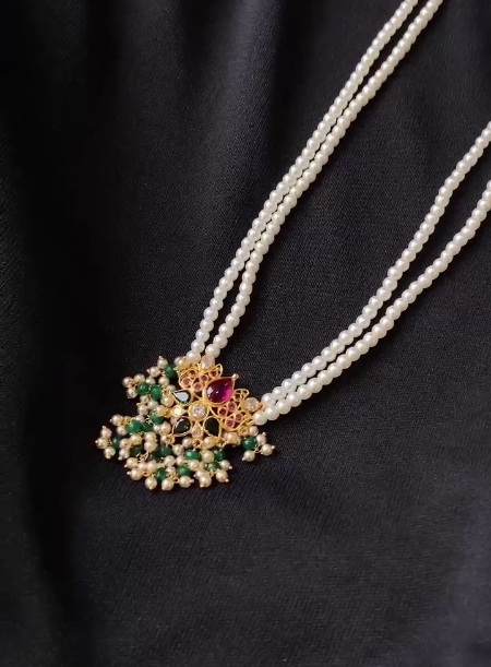White beads necklace with lotus pendant